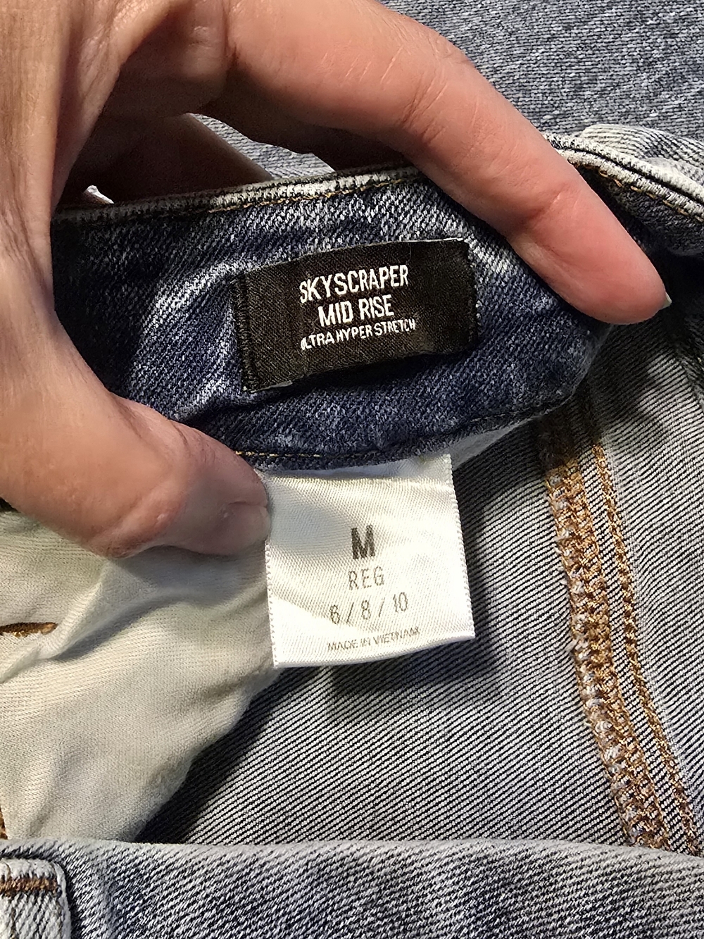 Express Skyscraper Light Wash Mid-Rise Bootcut Jeans - Picture 2 of 4